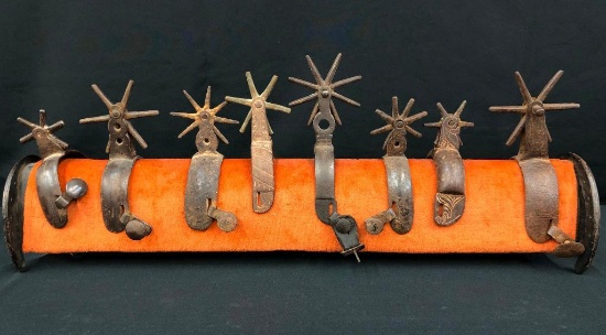 Eight Mexican Single Spurs with Display Bars