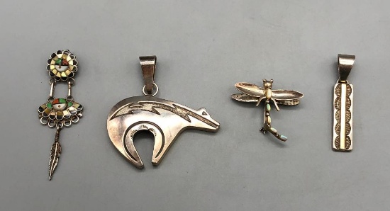 Four Sterling Silver Pendants