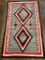 Antique Floor Rug with Whirling Logs Theme