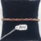 6.8g 10k Yellow Gold/Garnet Tennis Bracelet