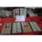 3 - uncut sheets of one dollar bills with gift boxes