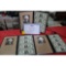 3 - uncut sheets of one dollar bills with gift boxes