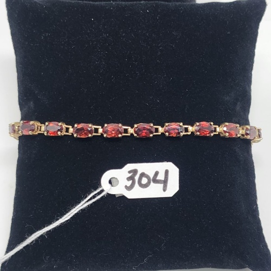 6.8g 10k Yellow Gold/Garnet Tennis Bracelet