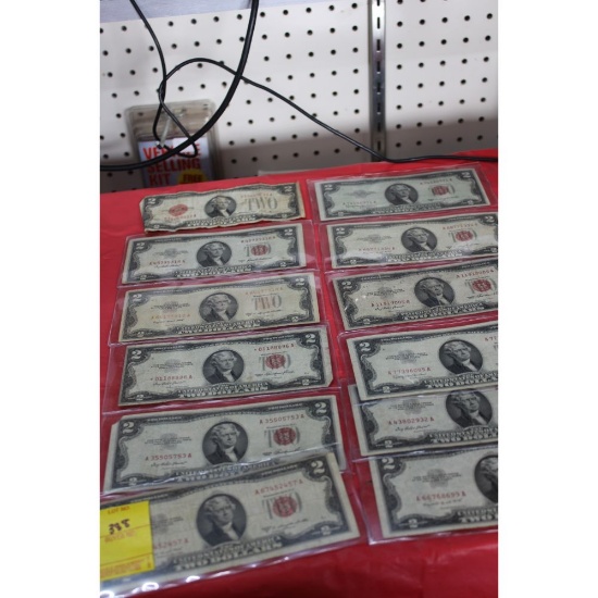 12 - red seal two dollar bills (1 is a star note)