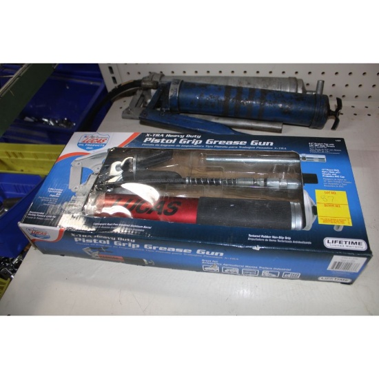 Three Grease Guns. One is new
