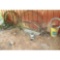Two wagon wheel bands and horse drawn plow with no handles
