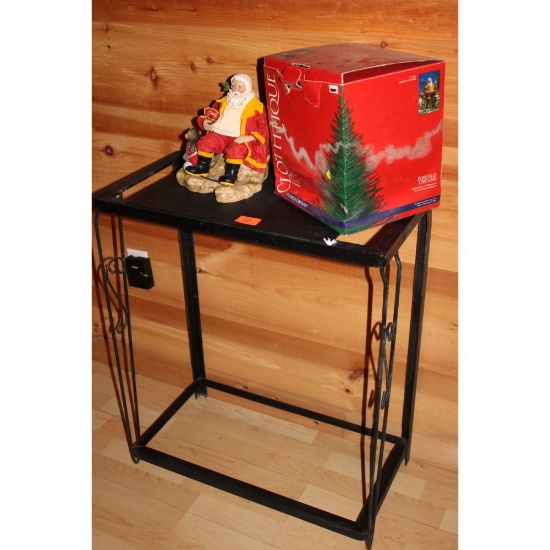 Metal side table and firefighter Santa Claus