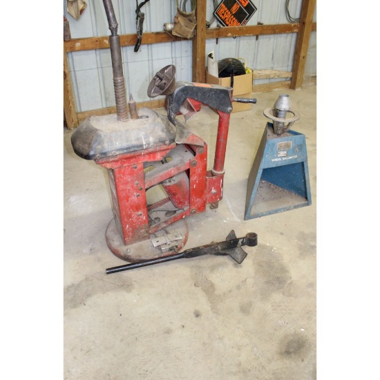 Tire changing machine and a Sears wheel balancer