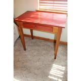 Small red stained topped desk
