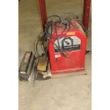 Lincoln electric AC225 arc welder with welding rods
