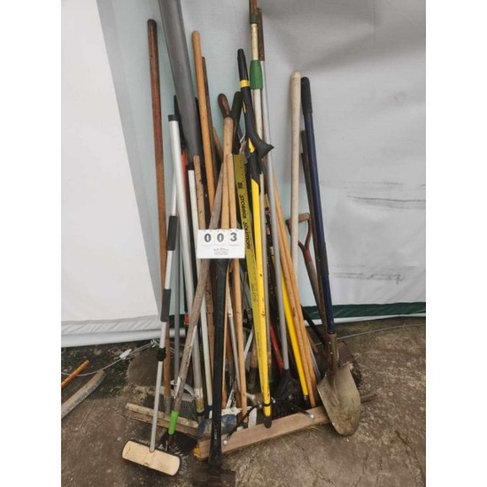 Large Stack of Hand Tools and Broom Handles