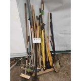 Large Stack of Hand Tools and Broom Handles