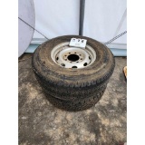 Two Eight Lug Wheels and Tires