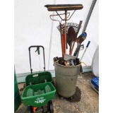Rolling Trash Can with Yard Tools and Two Seeders