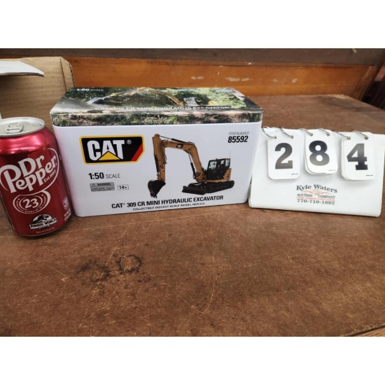 CAT 309CR Mini Hydraulic Excavator in Collector's Metal Tin 1:50 Scale