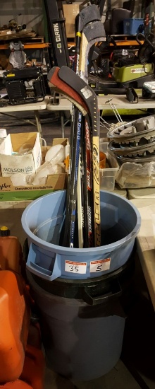 Hockey Sticks & Garbage Cans