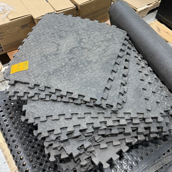 Interlocking rubber floor mats