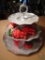 Tiered serving tray, vegetable salt and peppers, and covered strawberry dish