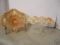 (2) pink/peach carnival glass dishes