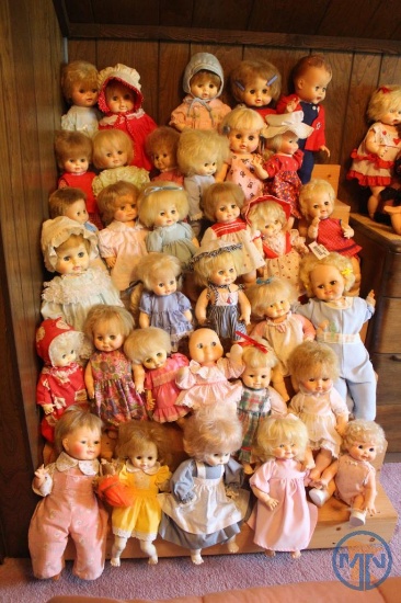 Baby dolls on riser