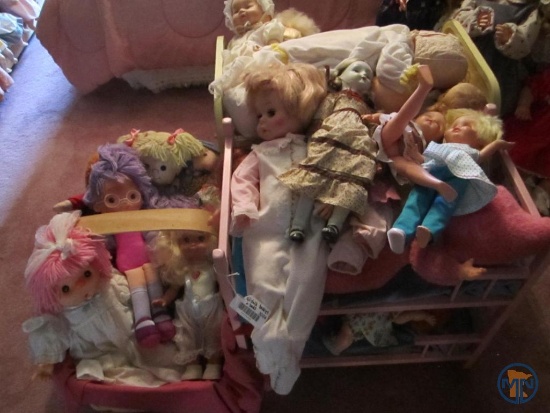 Baby dolls, (2) toy beds, and woven basket