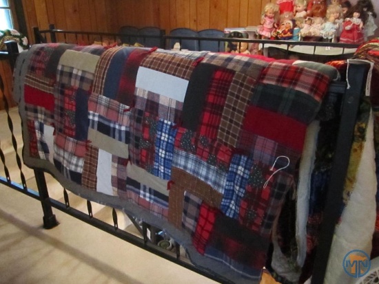 Homemade flannel Christmas themed quilt and other velvet quilt