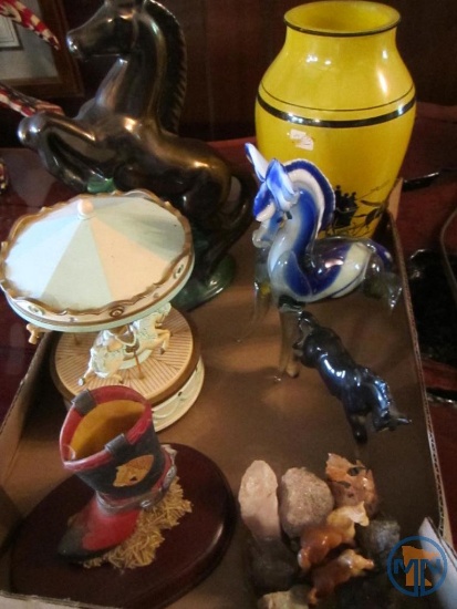 Musical carousel and horse figurines