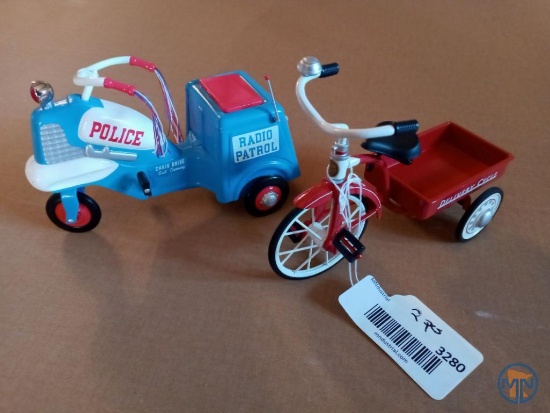 (2) Hallmark Kiddie Car Classics model pedal cars: 1958 Police Cycle and 1950 Delivery Cycle