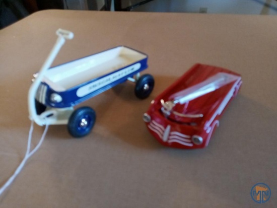 (2) Hallmark Kiddie Car Classics model pedal cars: 1935 Airflow Coaster and 1950 Aero Flite Wagon