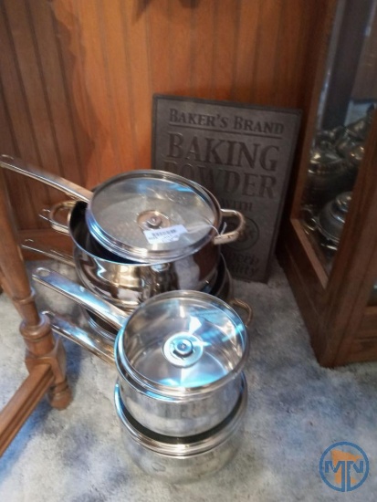 Chef's Secret Professional Series stainless steel pans and Bakers Brand baking powder sign