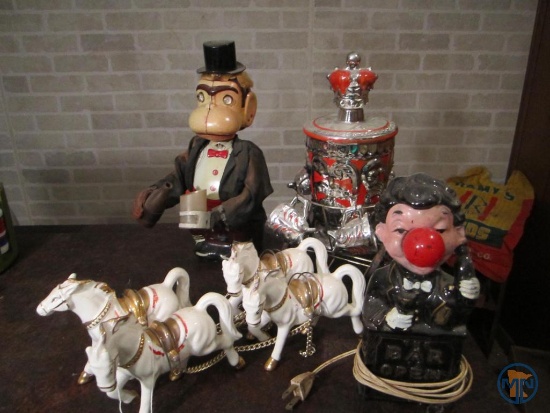 Novelty lamp, horse-drawn decanture, battery operated drinking monkey