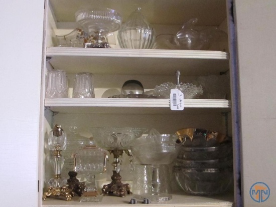 Clear glassware: covered pear dish, lighter, and other dishes