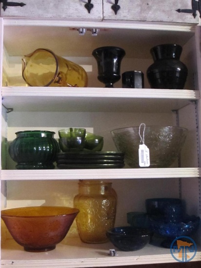 Green, blue, amber, purple, and black glassware