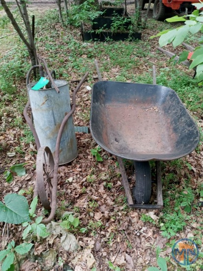 Walk-behind sprayer on steel and metal wheelbarrow