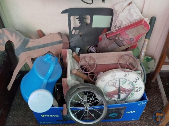 Garden tools: thermometer, seed spreader, waterer, pruners, wall art