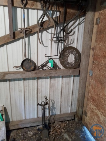 (2) ice tongs, cast iron pan, circular vent cover, corn row markers