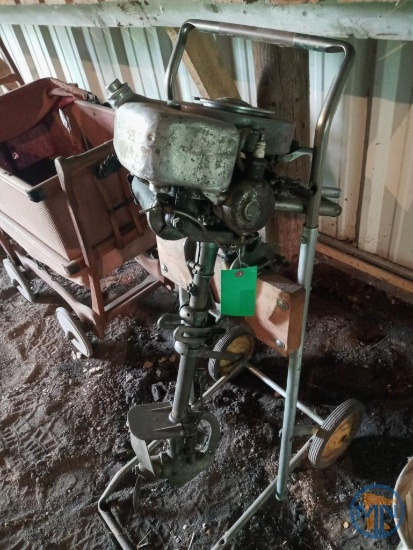 Vintage Johnson South Bend A17749 outboard boat motor on stand
