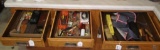 Folding tape measures, tool apron, gun cleaning tools, advertising bottle openers, drill bits