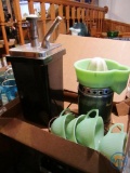 Fire King jadeite cups, Sunkist juicer, cherry syrup dispenser