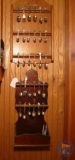 Spoon collection and wall mounted display; Disney's Mickey Mouse and others