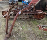 International side delivery rake
