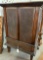 WOOD CABINET WITH CARVED PANEL DOORS