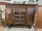 GLASS DOOR CARVED WOOD CABINET