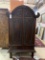 WOOD CABINET WITH CARVED PANEL DOORS