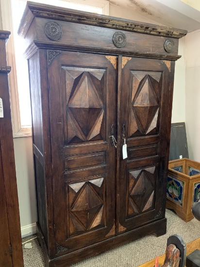 WOOD CABINET WITH CARVED PANEL DOORS