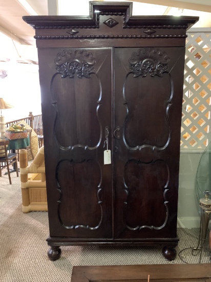 WOOD CABINET WITH CARVED PANEL DOORS