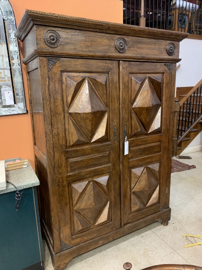 WOOD CABINET WITH CARVED PANEL DOORS
