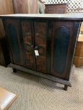 WOOD CABINET WITH CARVED PANEL DOORS