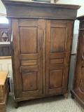 WOOD CABINET WITH CARVED PANEL DOORS