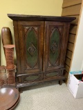 WOOD CABINET WITH CARVED PANEL DOORS